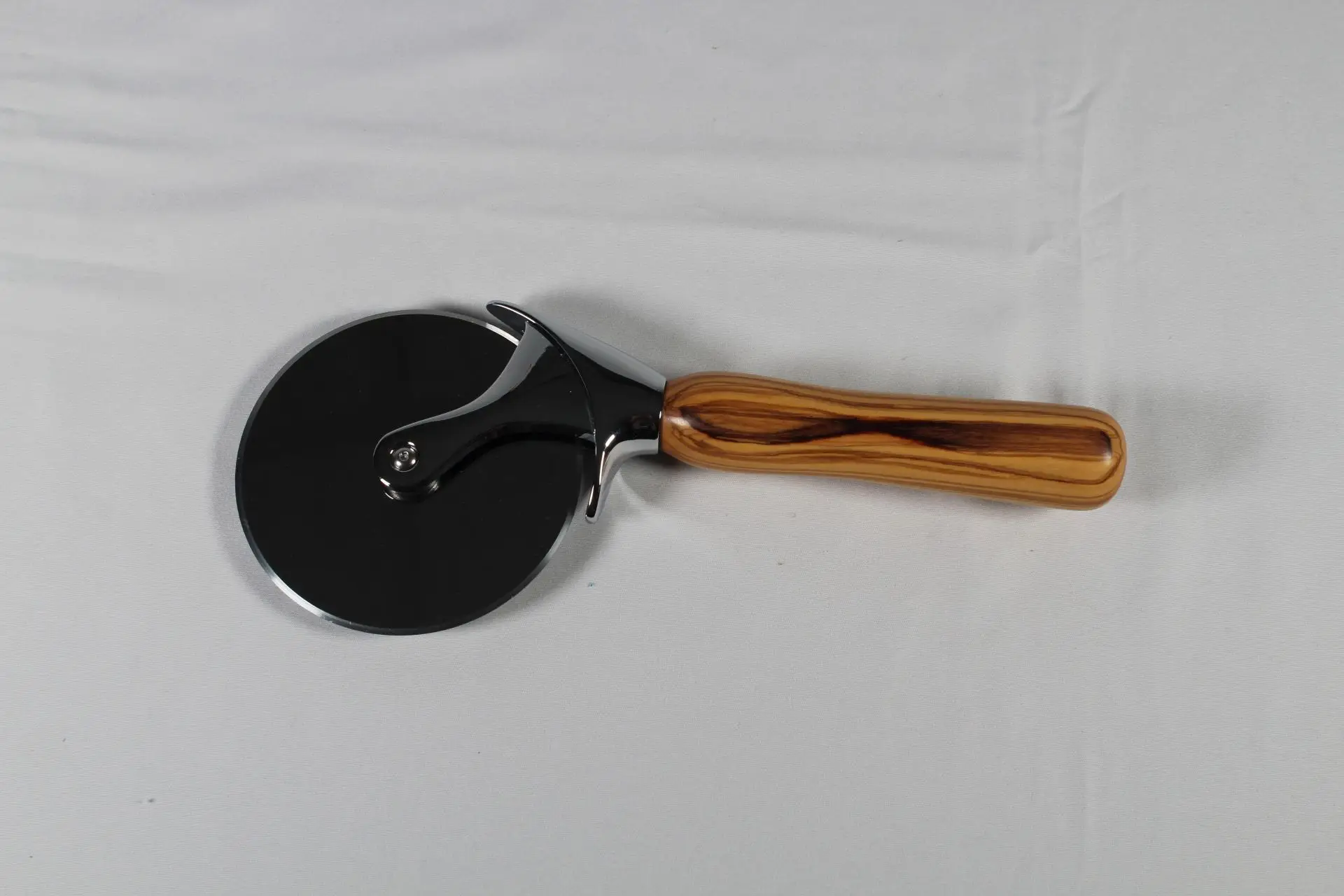 Hand Turned Olive Wood Pizza Cutter - Image 4